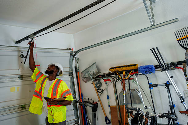 Professional Garage Door technician working in River Heights, UT
